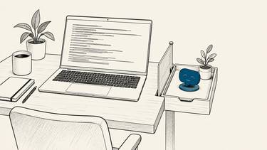 A blue speech token sits behind a divider beside a laptop displaying code-like lines.